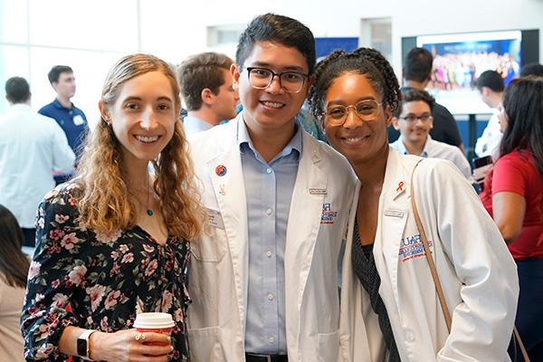 FAU M.D. students inside lobby at the Schmidt College of Medicine building